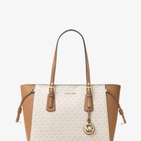 A white and brown purse is shown.